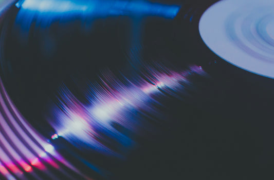 Vinyl vs. Digital: The Art of Crafting the Perfect Playlist